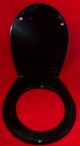 SEAT TOILET CELMAC BLACK PLASTIC WITH COVER
